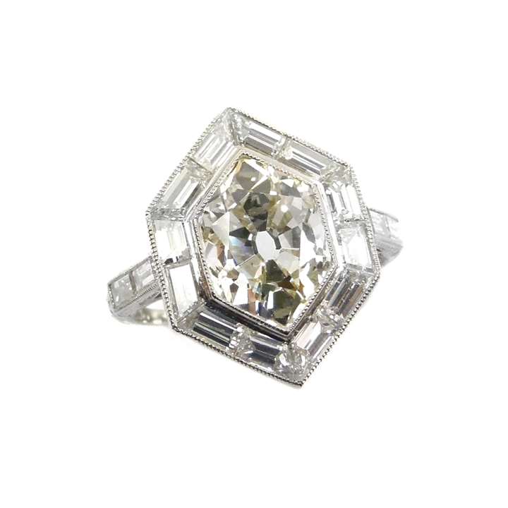 Single stone hexagonal diamond and baguette diamond cluster ring